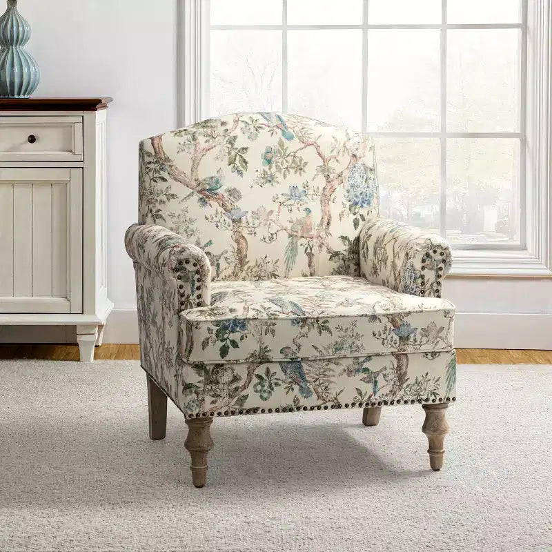 Wooden Upholstered Floral Pattern Armchair with Panel Arms and Camelback