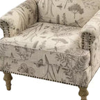 Wooden Upholstered Floral Pattern Armchair with Panel Arms and Camelback