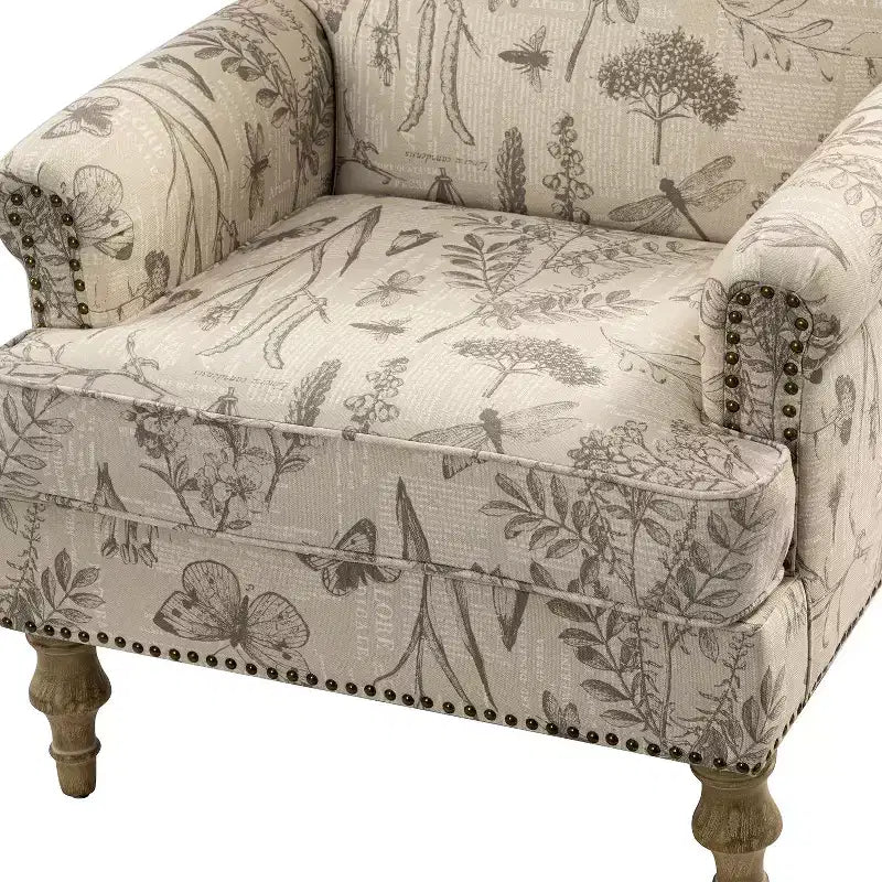 Wooden Upholstered Floral Pattern Armchair with Panel Arms and Camelback