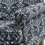 Wooden Upholstered Floral Pattern Armchair with Panel Arms and Camelback