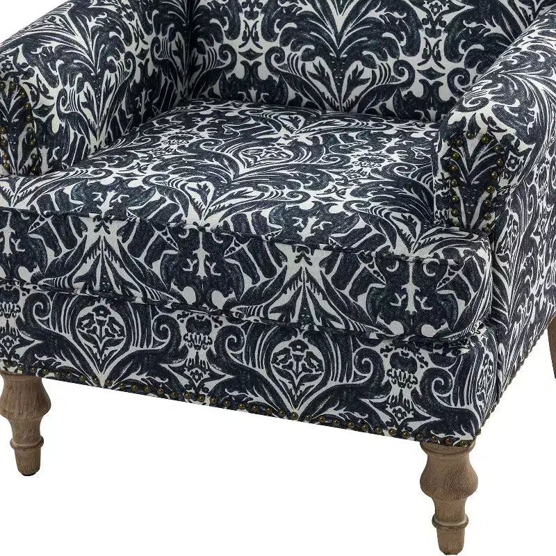 Wooden Upholstered Floral Pattern Armchair with Panel Arms and Camelback