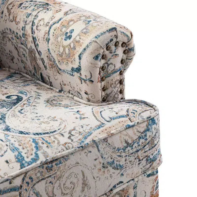 Wooden Upholstered Floral Pattern Armchair with Panel Arms and Camelback