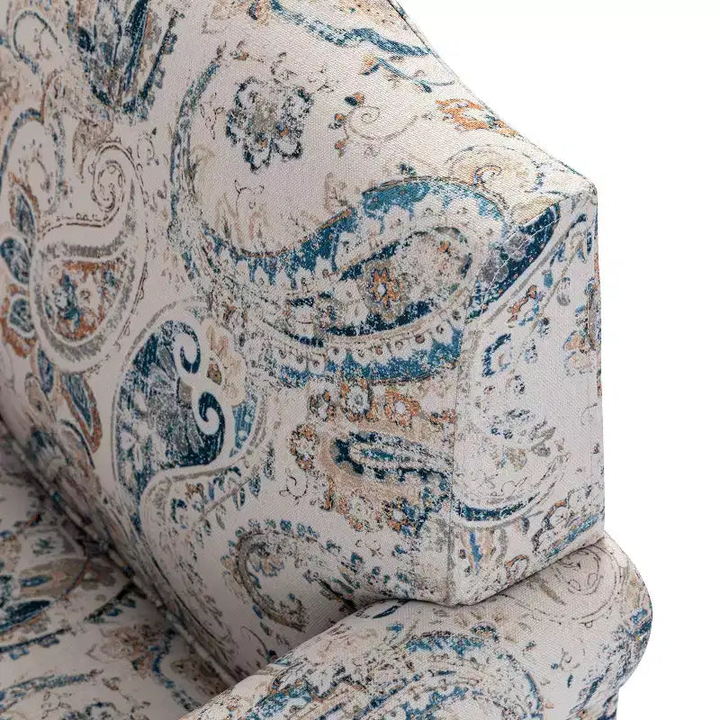 Wooden Upholstered Floral Pattern Armchair with Panel Arms and Camelback