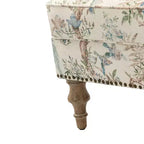 Wooden Upholstered Floral Pattern Armchair with Panel Arms and Camelback