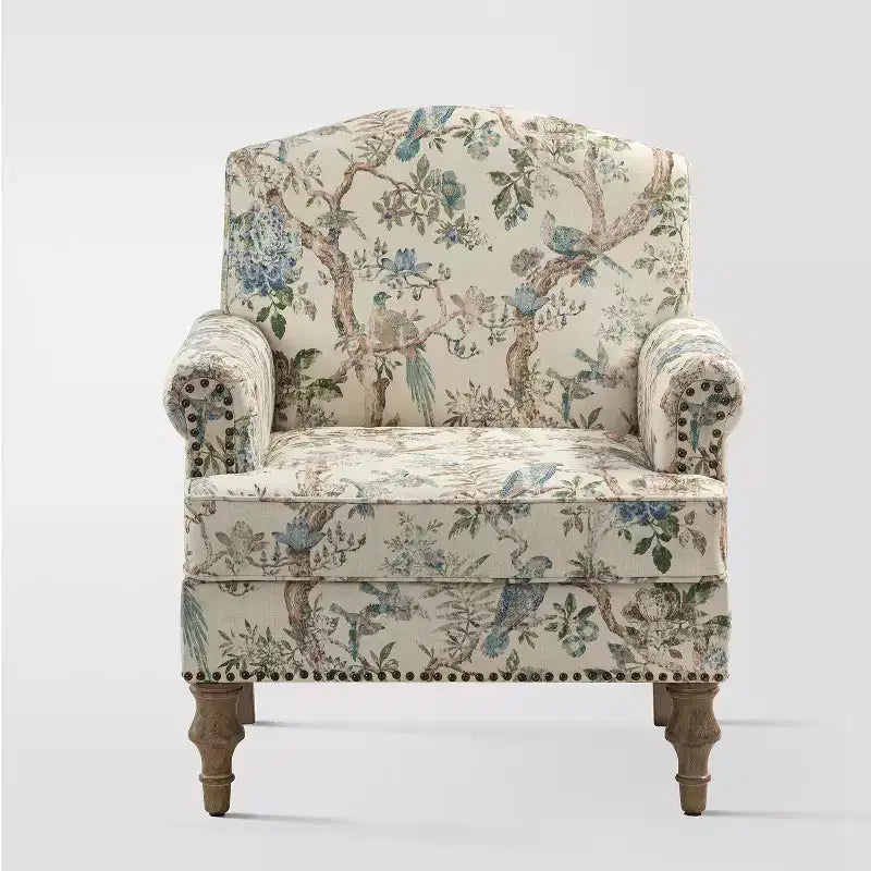 Wooden Upholstered Floral Pattern Armchair with Panel Arms and Camelback
