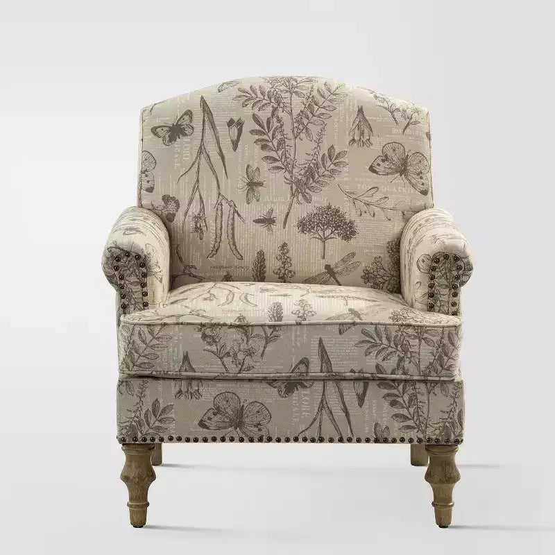 Wooden Upholstered Floral Pattern Armchair with Panel Arms and Camelback