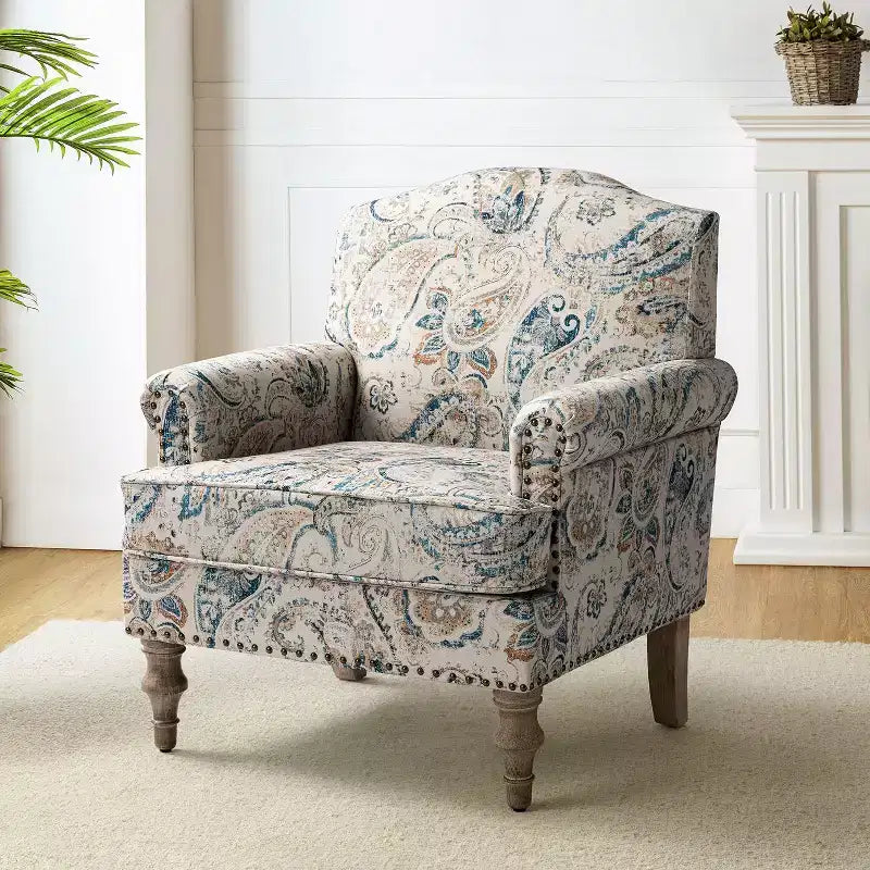 Wooden Upholstered Floral Pattern Armchair with Panel Arms and Camelback